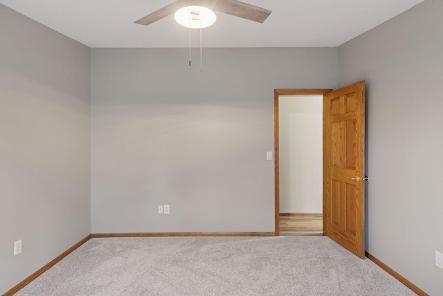 34115 Malmberg Ave, Chisago Lake Twp, MN 55045 - carpeted empty room featuring baseboards and a ceiling fan