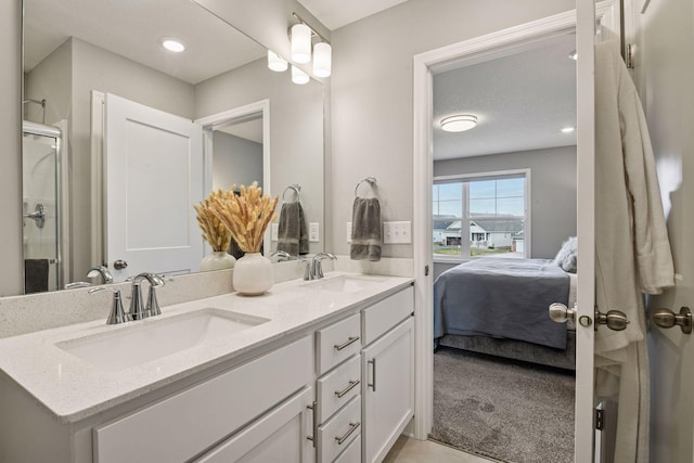 9444 Bridle Way, Victoria, MN 55386 - ensuite bathroom featuring double vanity and a shower with shower door