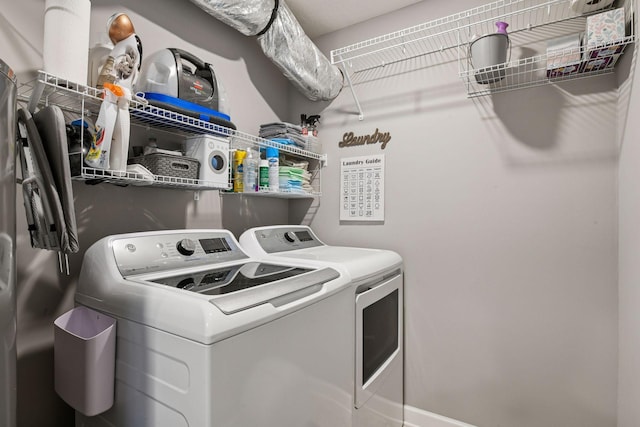 9444 Bridle Way, Victoria, MN 55386 - laundry room featuring washing machine and dryer