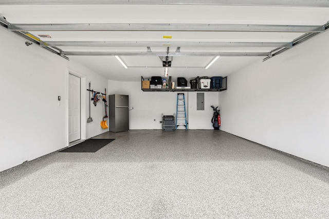 9444 Bridle Way, Victoria, MN 55386 - garage with freestanding refrigerator, electric panel, and a garage door opener
