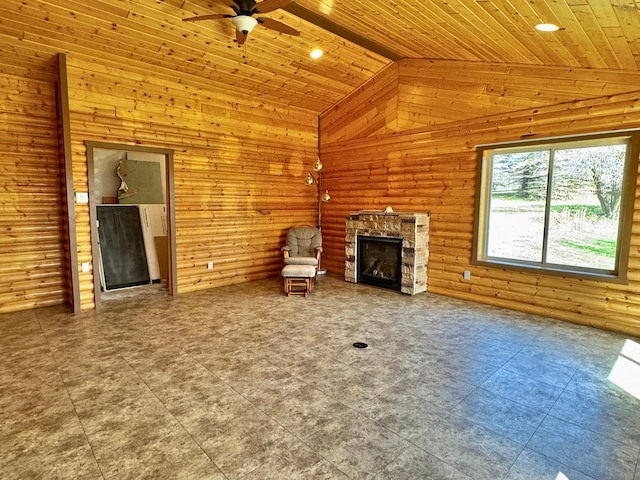 unfurnished living room featuring a ceiling fan, wooden ceiling, a stone fireplace, high vaulted ceiling, and recessed lighting