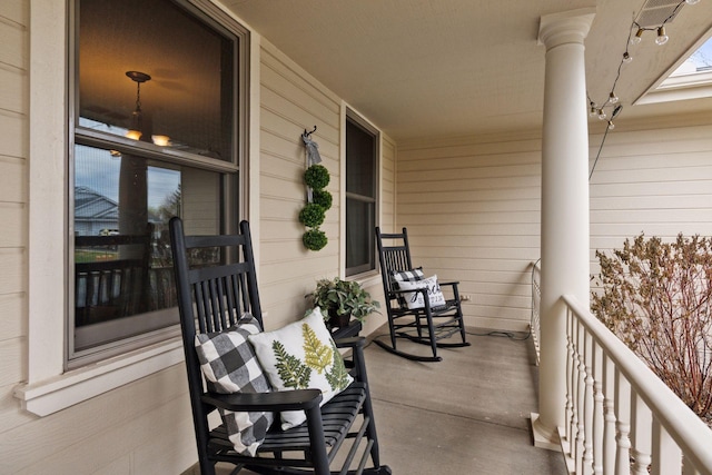 balcony featuring covered porch
