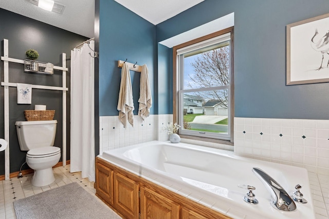 bathroom featuring visible vents, a shower with shower curtain, toilet, and a bath