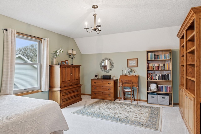 bedroom featuring light colored carpet, baseboards, a notable chandelier, a textured ceiling, and lofted ceiling