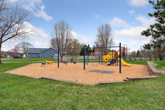 community play area with a lawn
