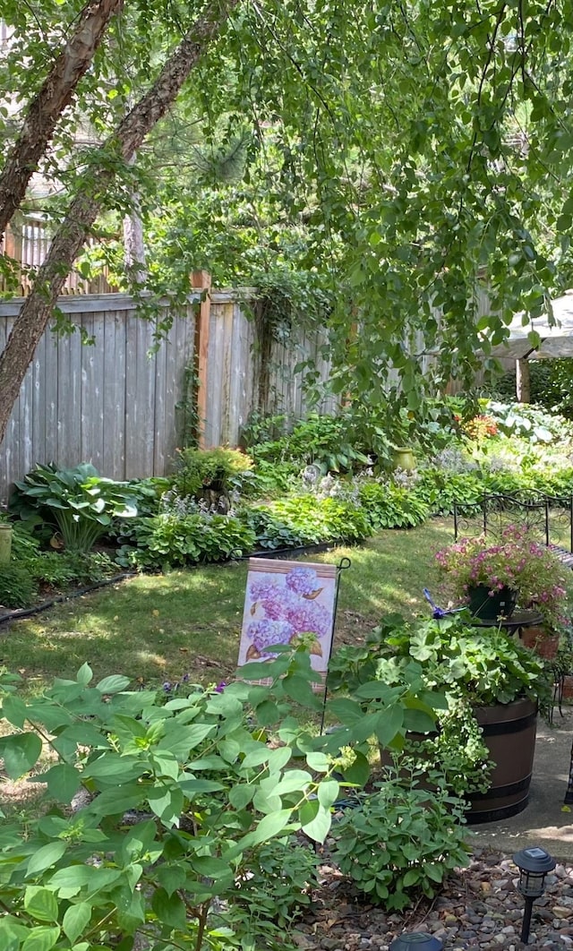 view of yard with fence