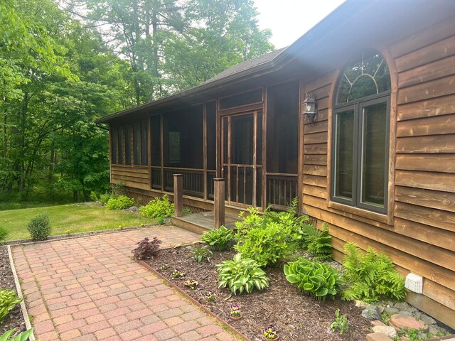 10822 Steamboat Loop NW, Walker, MN 56484 - view of patio / terrace featuring a sunroom