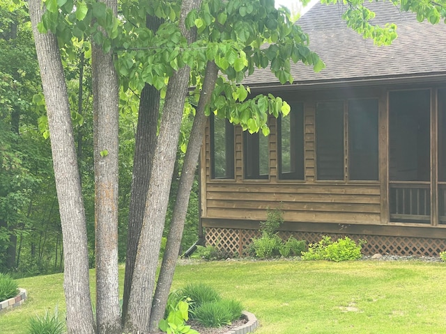 10822 Steamboat Loop NW, Walker, MN 56484 - view of property exterior with roof with shingles and a lawn