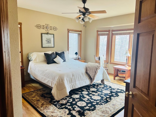 10822 Steamboat Loop NW, Walker, MN 56484 - bedroom with light wood-type flooring and ceiling fan