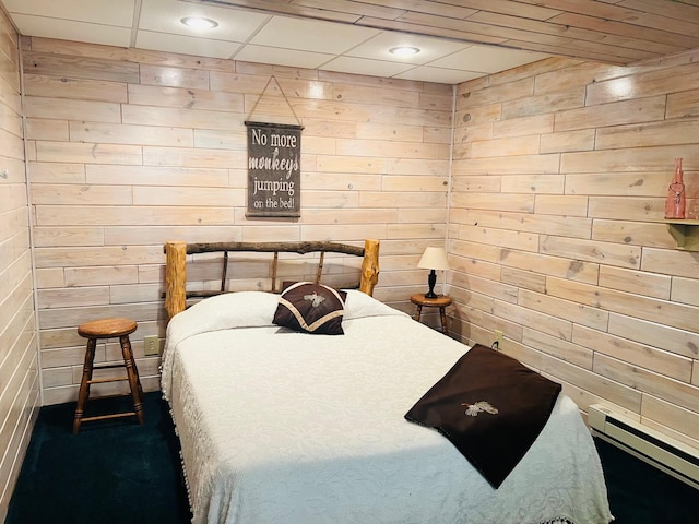 10822 Steamboat Loop NW, Walker, MN 56484 - bedroom with baseboard heating and wood walls