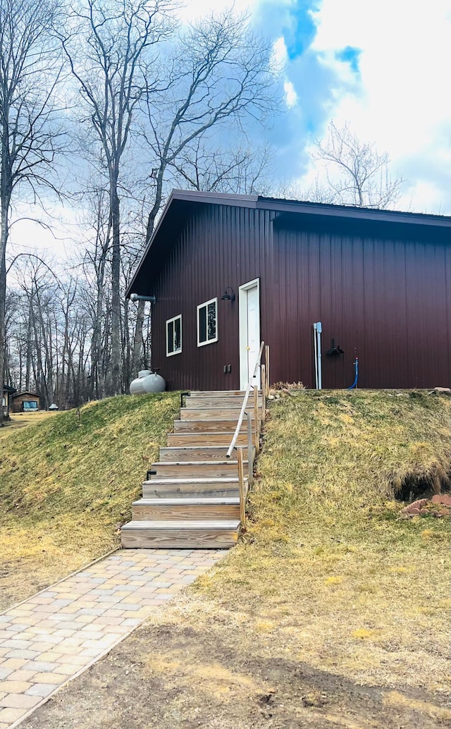 10822 Steamboat Loop NW, Walker, MN 56484 - view of front of house with board and batten siding