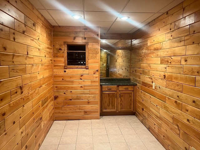10822 Steamboat Loop NW, Walker, MN 56484 - bar featuring wood walls and light tile patterned flooring