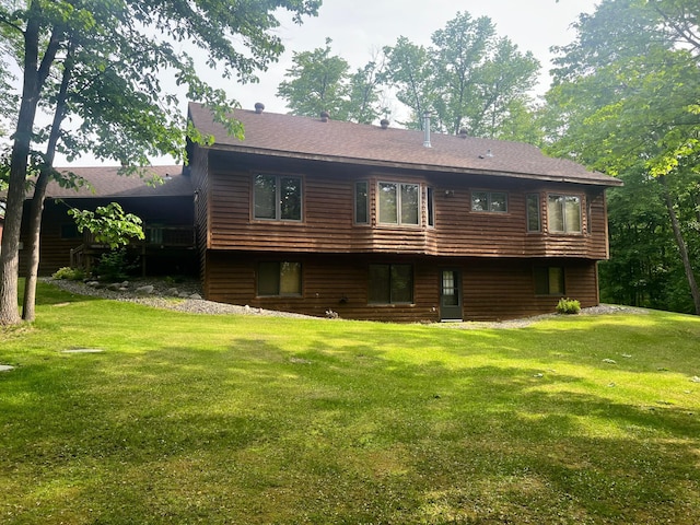 10822 Steamboat Loop NW, Walker, MN 56484 - rear view of property with a yard and roof with shingles