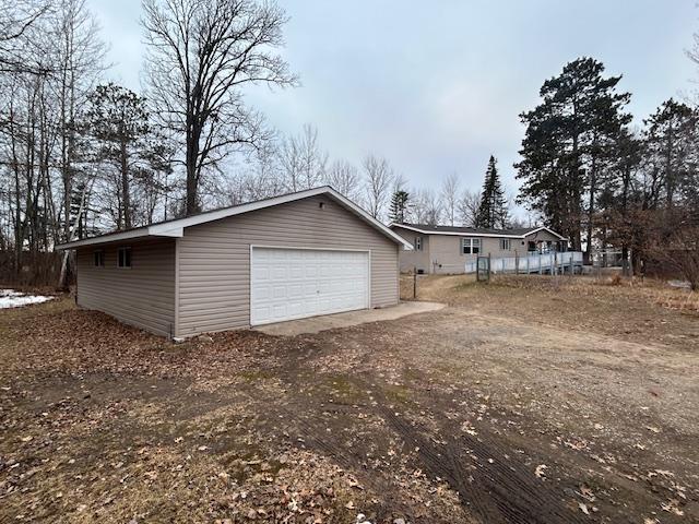 54966 Rainbow Rd, Sand Lake Twp, MN 56636 - view of side of property with a garage and an outdoor structure
