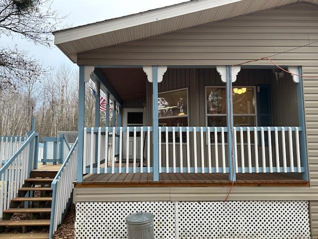 54966 Rainbow Rd, Sand Lake Twp, MN 56636 - porch with stairs