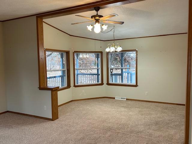 54966 Rainbow Rd, Sand Lake Twp, MN 56636 - carpeted spare room with ceiling fan, ornamental molding, a chandelier, vaulted ceiling, and a textured ceiling