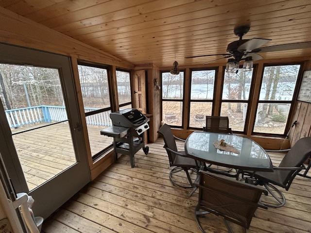 54966 Rainbow Rd, Sand Lake Twp, MN 56636 - sunroom featuring a wooden deck, hardwood / wood-style flooring, and wooden ceiling