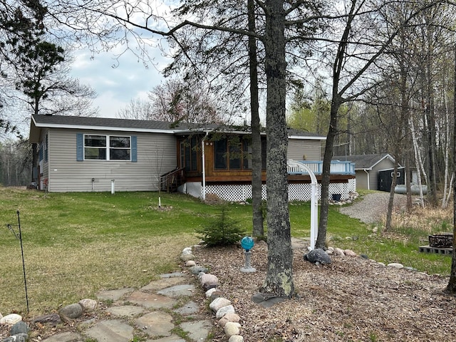 54966 Rainbow Rd, Sand Lake Twp, MN 56636 - manufactured / mobile home with a front lawn and a deck