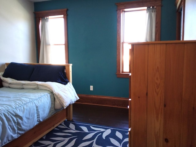 bedroom featuring baseboards