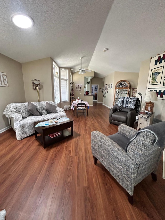 2548 Sumac Rdg, White Bear Lake, MN 55110 - living room featuring baseboards, a ceiling fan, a textured ceiling, and wood finished floors
