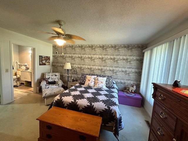 2548 Sumac Rdg, White Bear Lake, MN 55110 - bedroom featuring a textured ceiling, ceiling fan, light carpet, and ensuite bath