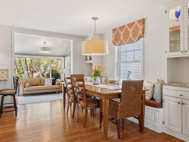 dining area featuring wood-type flooring