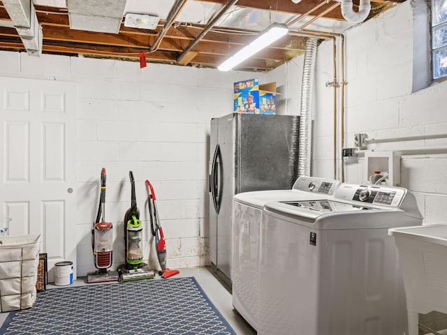 laundry area with washer and clothes dryer