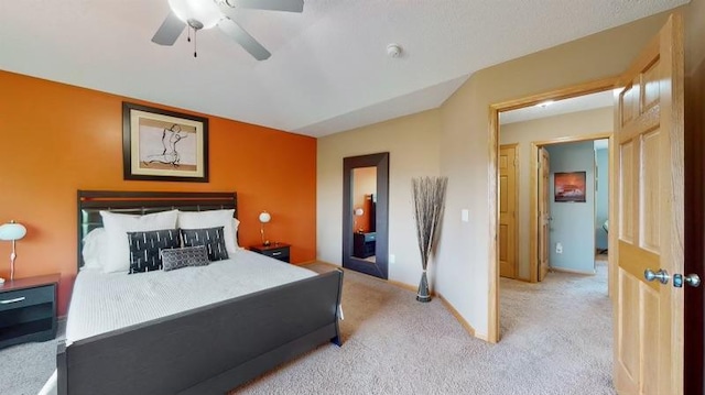 11373 Balsam Way, Woodbury, MN 55129 - bedroom with light carpet, baseboards, and a ceiling fan