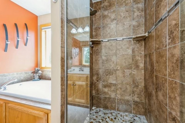11373 Balsam Way, Woodbury, MN 55129 - full bathroom featuring vanity and a tile shower