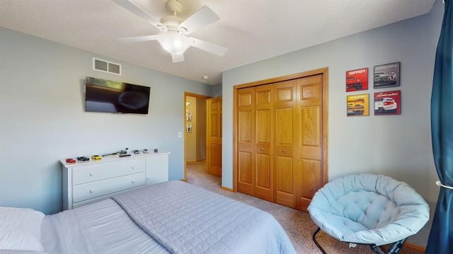 11373 Balsam Way, Woodbury, MN 55129 - bedroom featuring a closet, ceiling fan, carpet flooring, and visible vents