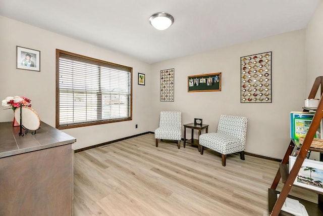 1408 72nd Ave S, Fargo, ND 58104 - living area featuring light wood finished floors and baseboards