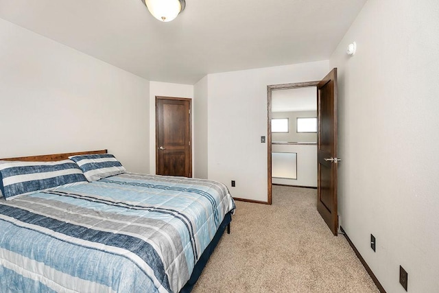 1408 72nd Ave S, Fargo, ND 58104 - bedroom with light colored carpet and baseboards
