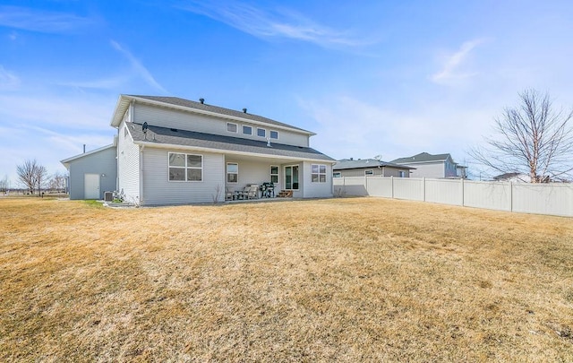 1408 72nd Ave S, Fargo, ND 58104 - back of property featuring a patio area and central AC