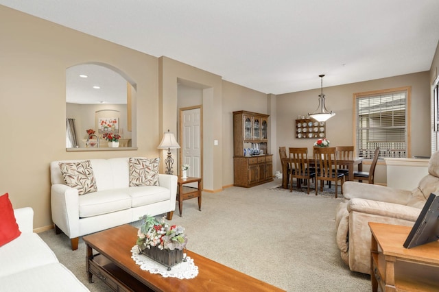 13775 54th Ave N, Plymouth, MN 55446 - living area featuring light colored carpet and arched walkways
