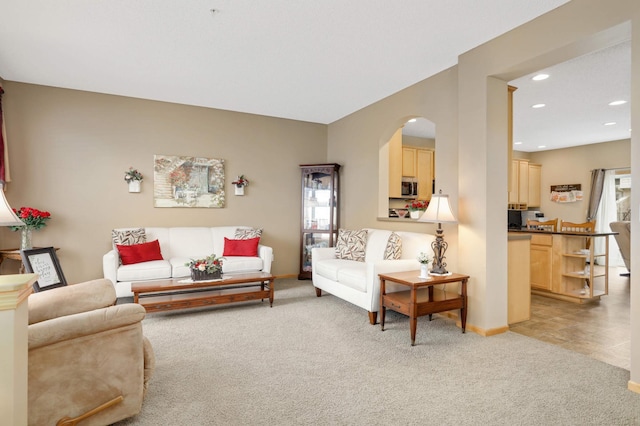 13775 54th Ave N, Plymouth, MN 55446 - living area featuring light colored carpet, arched walkways, and recessed lighting