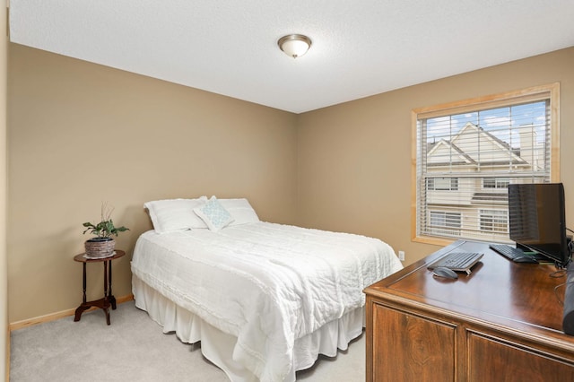 13775 54th Ave N, Plymouth, MN 55446 - bedroom with light colored carpet and a desk