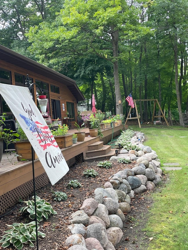 view of yard featuring a deck