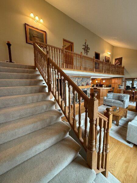 stairway featuring wood finished floors