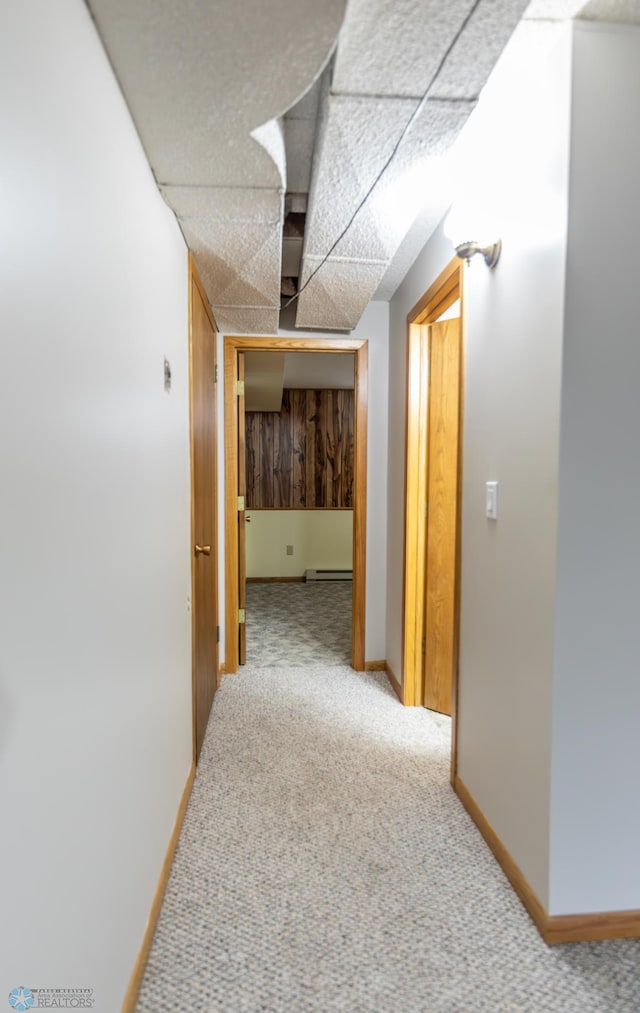 1611 32nd St S, Fargo, ND 58103 - hall with carpet floors, baseboards, and a baseboard radiator