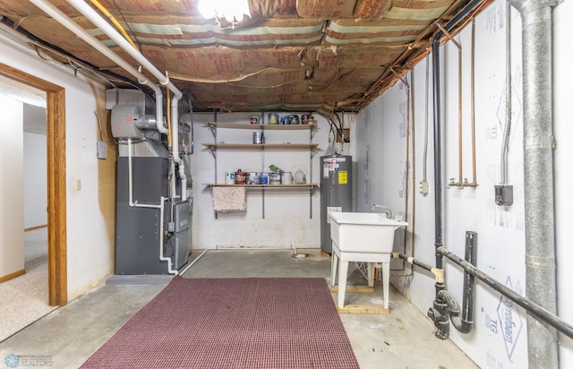 1611 32nd St S, Fargo, ND 58103 - unfinished below grade area featuring water heater and heating unit