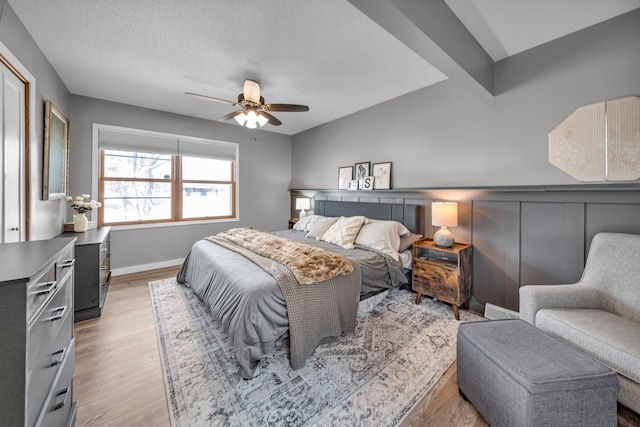 502 Seminole Ave, Osceola, WI 54020 - bedroom with light wood-style flooring and ceiling fan