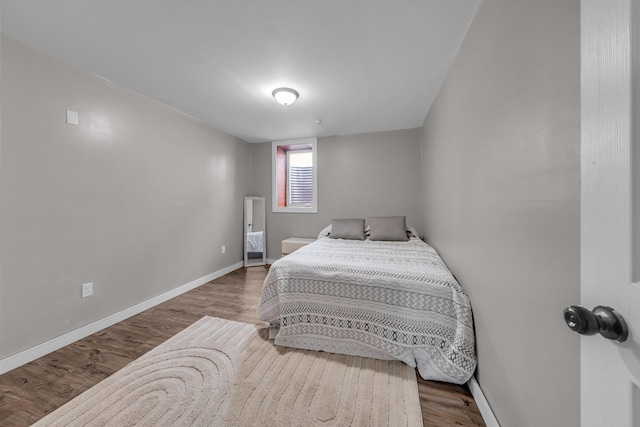 502 Seminole Ave, Osceola, WI 54020 - bedroom with wood finished floors and baseboards