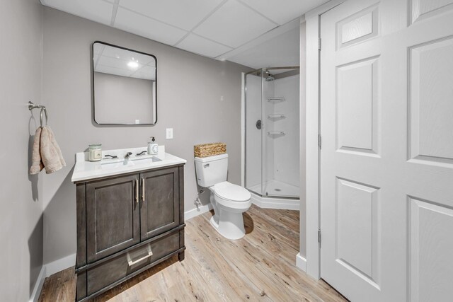502 Seminole Ave, Osceola, WI 54020 - full bathroom featuring wood finished floors, vanity, and a shower stall