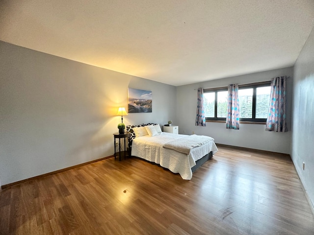 4120 Parklawn Ave Unit 134, Edina, MN 55435 - bedroom with wood finished floors and baseboards