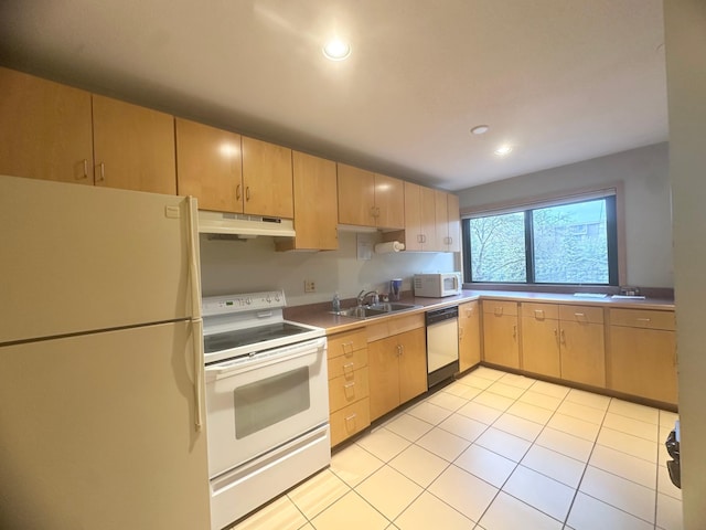 4120 Parklawn Ave Unit 134, Edina, MN 55435 - kitchen featuring white appliances, light brown cabinetry, under cabinet range hood, light tile patterned flooring, and a sink