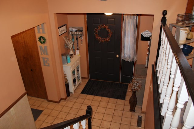 100 Park Rd, Staples, MN 56479 - foyer entrance featuring light tile patterned flooring and stairway