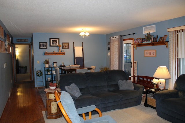 100 Park Rd, Staples, MN 56479 - living area with hardwood / wood-style flooring and a chandelier