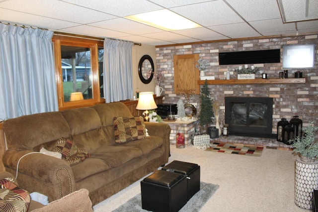 100 Park Rd, Staples, MN 56479 - carpeted living area featuring a brick fireplace and a paneled ceiling