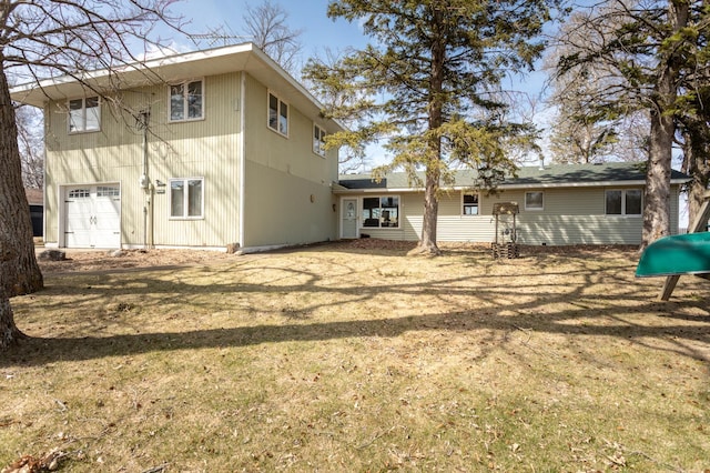 back of house with a yard