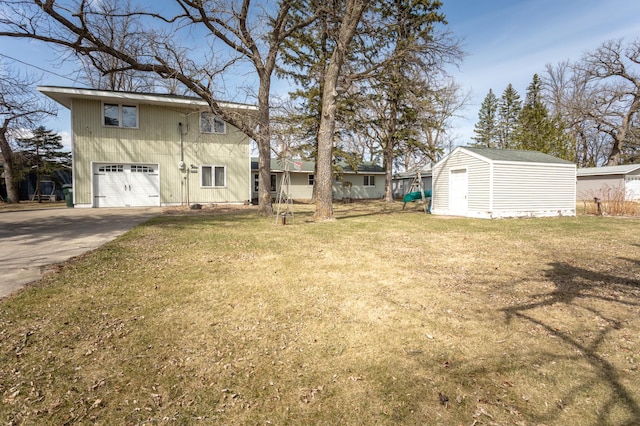 8236 Lake Carlos Dr NE, Carlos, MN 56319 - view of green lawn featuring an attached garage and concrete driveway
